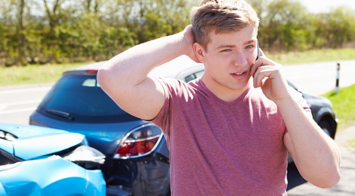 Driver Making Phone Call After traffic Accident