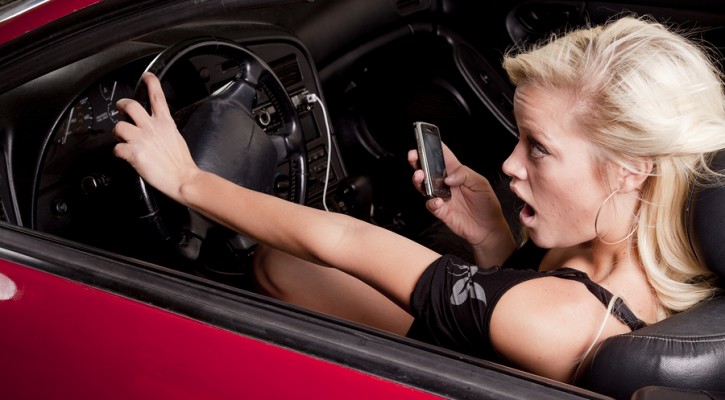 Woman Phone Car About To Crash
