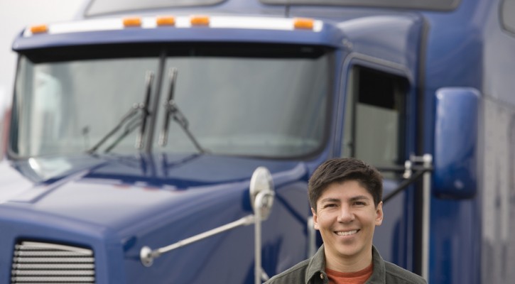 Man standing in front of truck